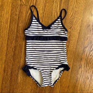 striped one piece bathing suit with ruffle detail